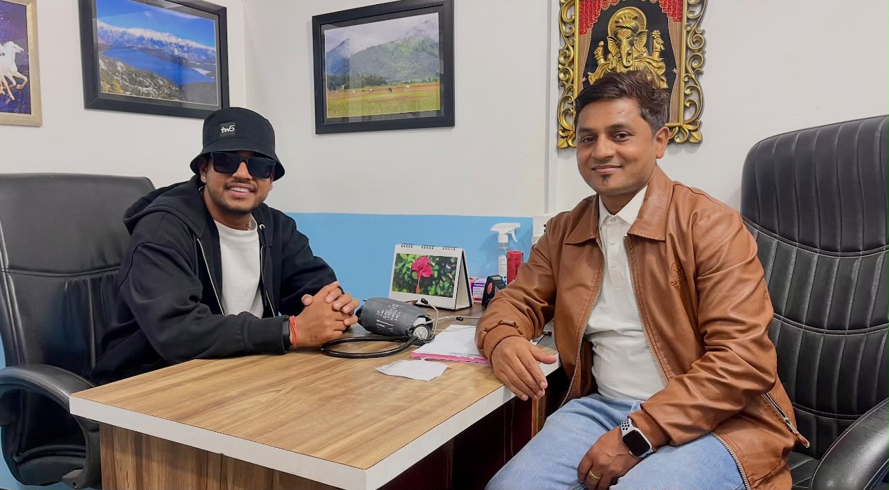 Dr. Sagar Pokherel meeting a guest at the clinic